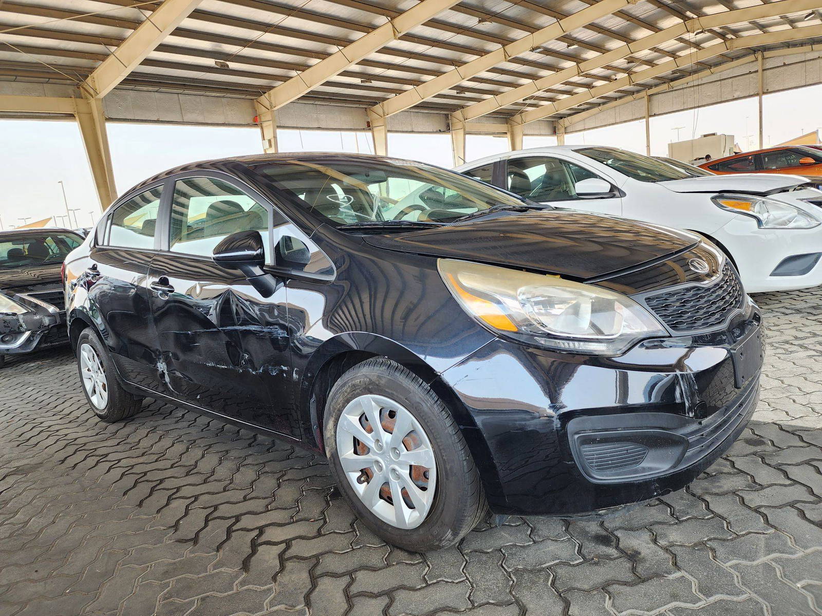 2014 KIA RIO — 119965 Miles — Lot 43988934 — Souq - Marhaba Auctions Used Cars - Image 4