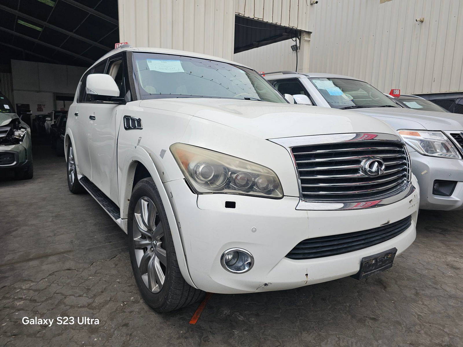 2012 INFINITI QX56 — 226822 Miles — Lot 7C9021040 — Main - Marhaba Auctions Used Cars - Image 4