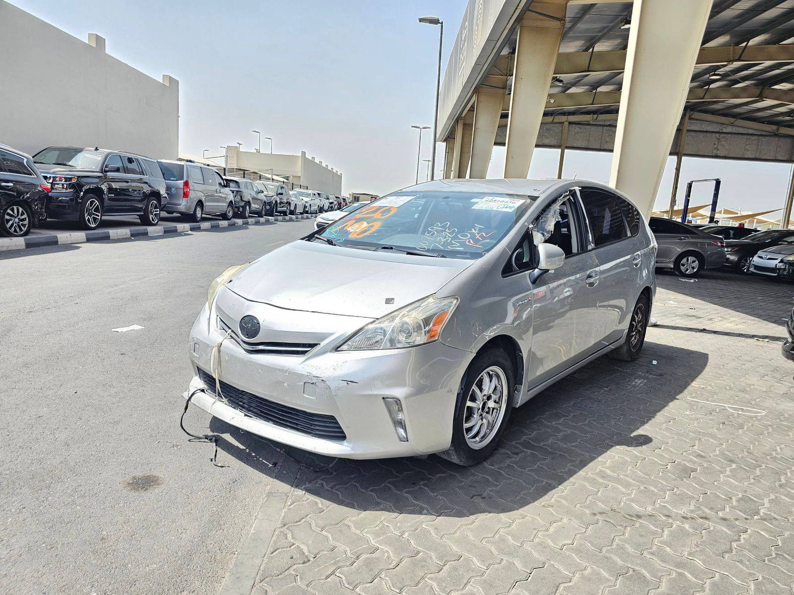2014 TOYOTA PRIUS V — 246664 Miles — Lot 42510436 — Souq - Marhaba Auctions Used Cars - Image 4