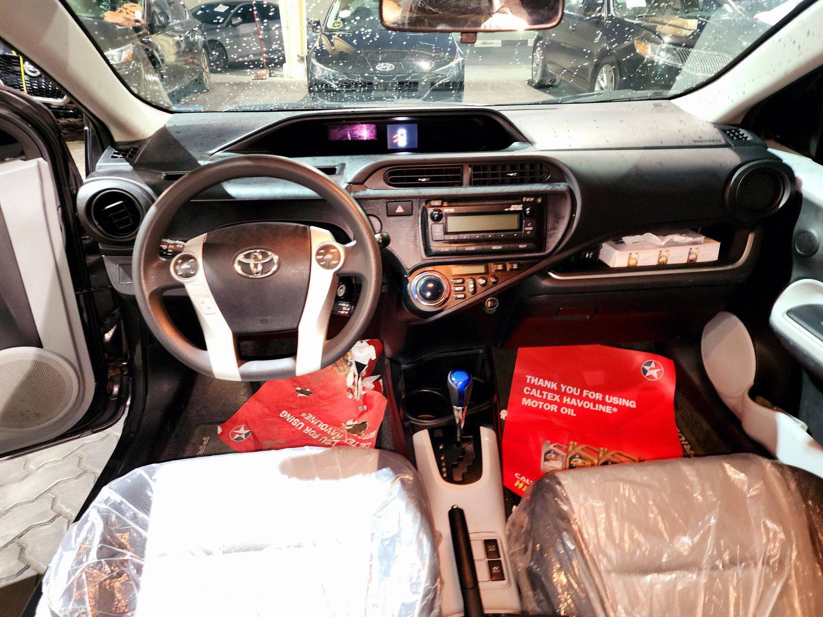 2014 TOYOTA PRIUS C — 115458 Miles — Lot 1083638 — Souq - Marhaba Auctions Used Cars - Image 7