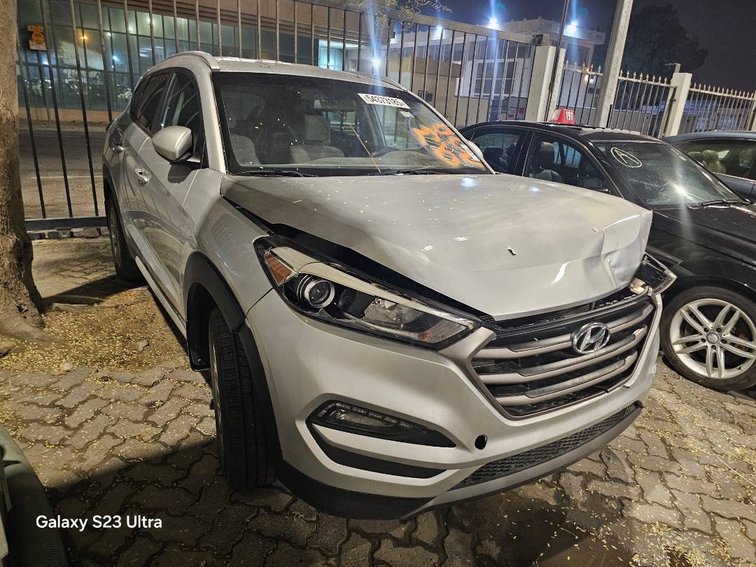 2018 HYUNDAI TUCSON — 90607 Miles — Lot 54373185 — Main - Marhaba Auctions Used Cars - Image 4