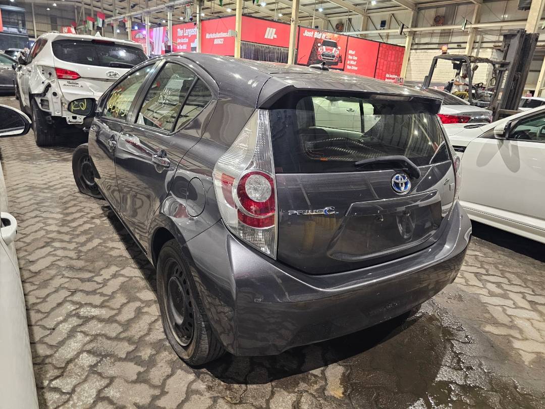 2014 TOYOTA PRIUS C — 125564 Miles — Lot 9E1078350 — Souq - Marhaba Auctions Used Cars - Image 3