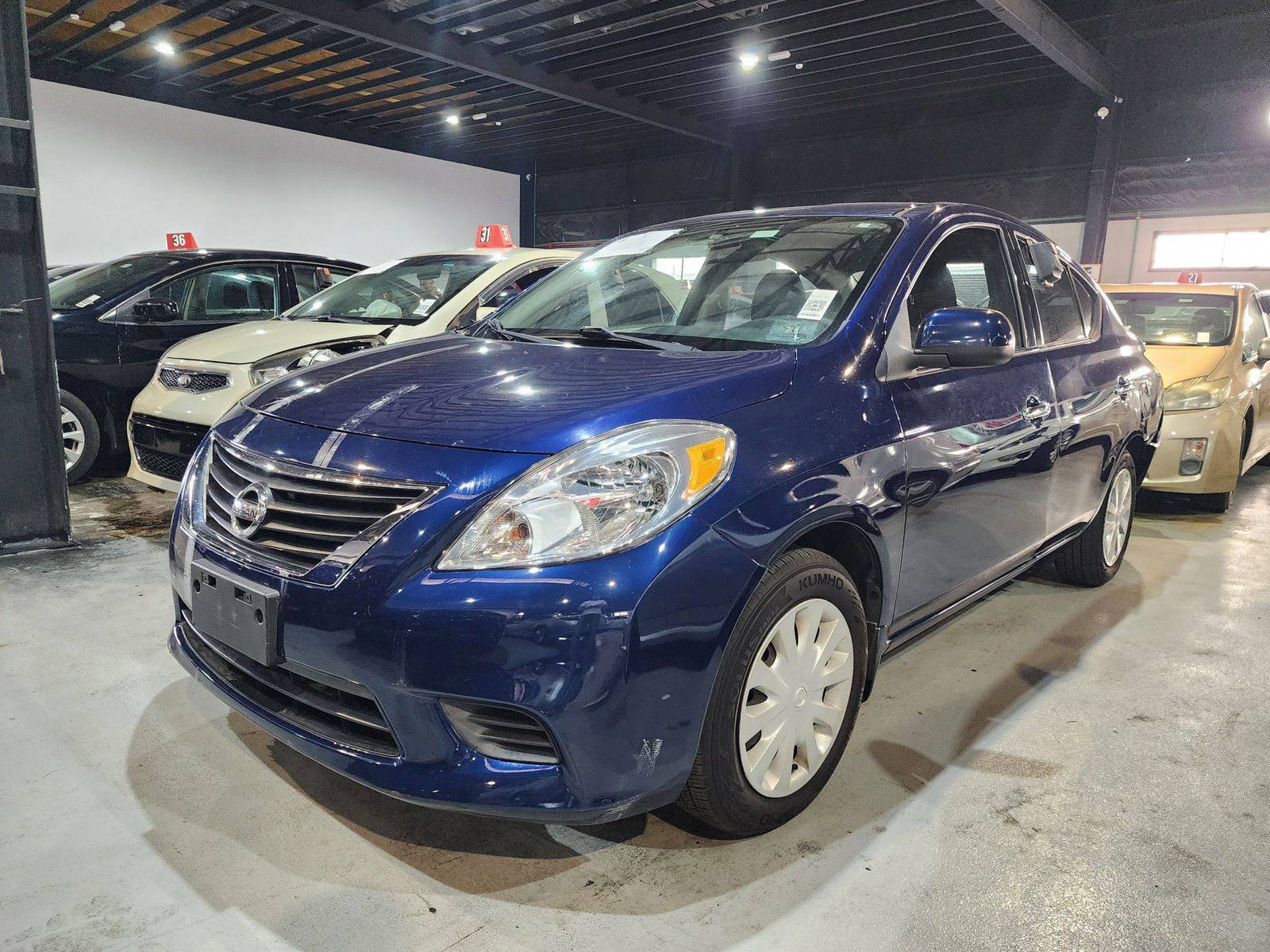 2014 NISSAN VERSA — 128689 Miles — Lot AP7EL808426 — Al Quoz - Marhaba Auctions Used Cars - Image 4
