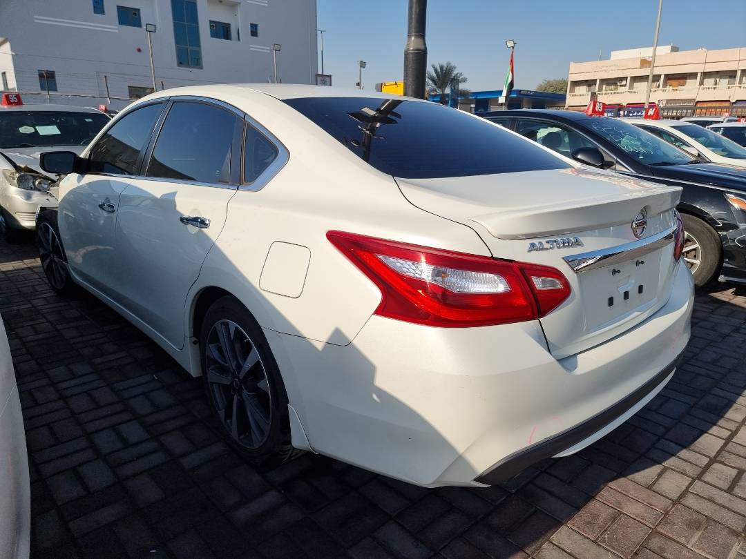 2016 NISSAN ALTIMA — 143562 Miles — Lot 215487 — Ind. 12 - Marhaba Auctions Used Cars - Image 4