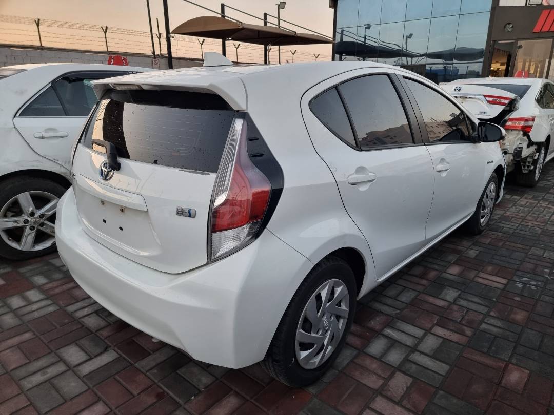 2015 TOYOTA PRIUS C — 128879 Miles — Lot 215487 — Ind. 12 - Marhaba Auctions Used Cars - Image 4