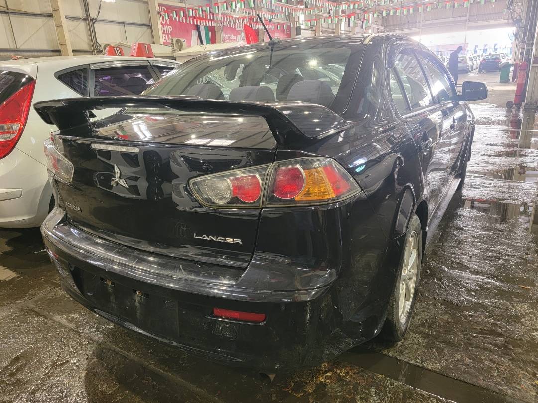 2010 MITSUBISHI LANCER — 285563 KM — Lot 73655874 — Main - Marhaba Auctions Used Cars - Image 3