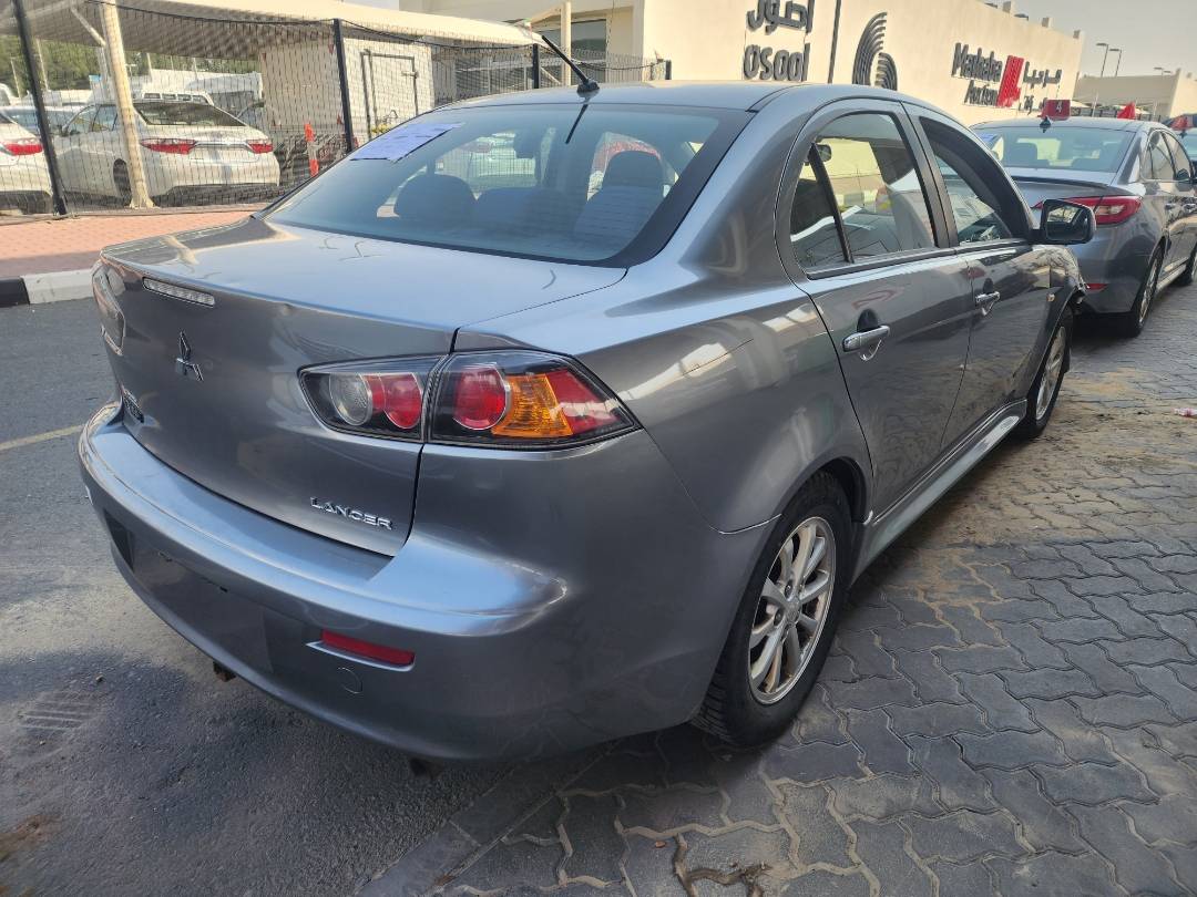 2014 MITSUBISHI LANCER — 170812 KM — Lot 604783 - Marhaba Auctions Used Cars - Image 10