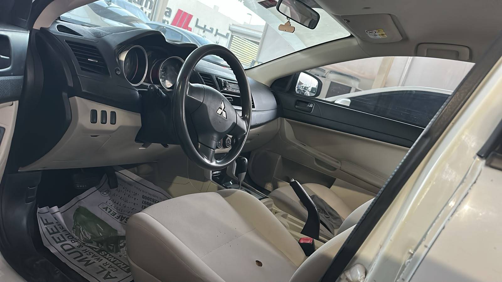 2016 MITSUBISHI LANCER — 145385 KM — Lot U730458 — Souq - Marhaba Auctions Used Cars - Image 7