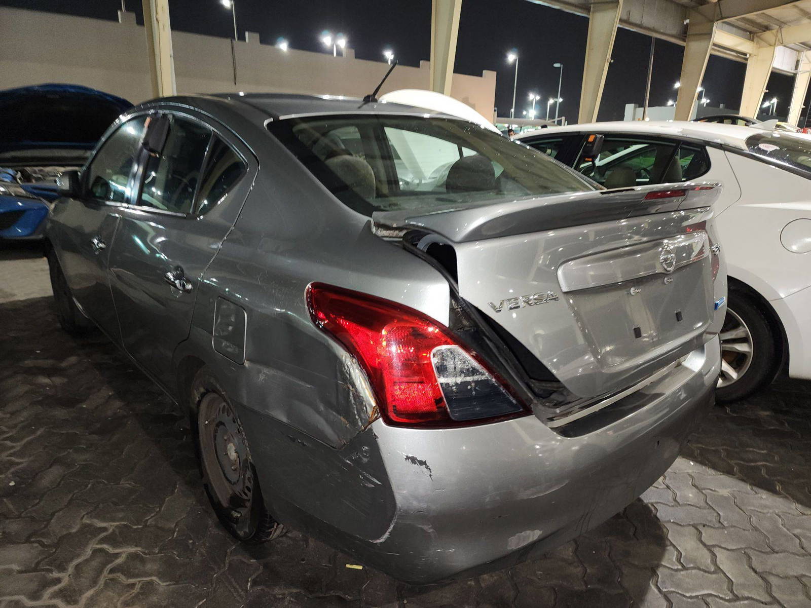 2013 NISSAN VERSA — 157077 Miles — Lot 76884073 - Marhaba Auctions Used Cars - Image 4
