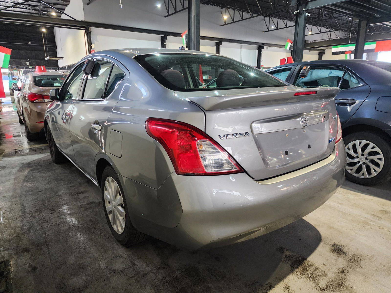 2014 NISSAN VERSA — 176212 KM — Lot 79535904 — Al Quoz - Marhaba Auctions Used Cars - Image 4