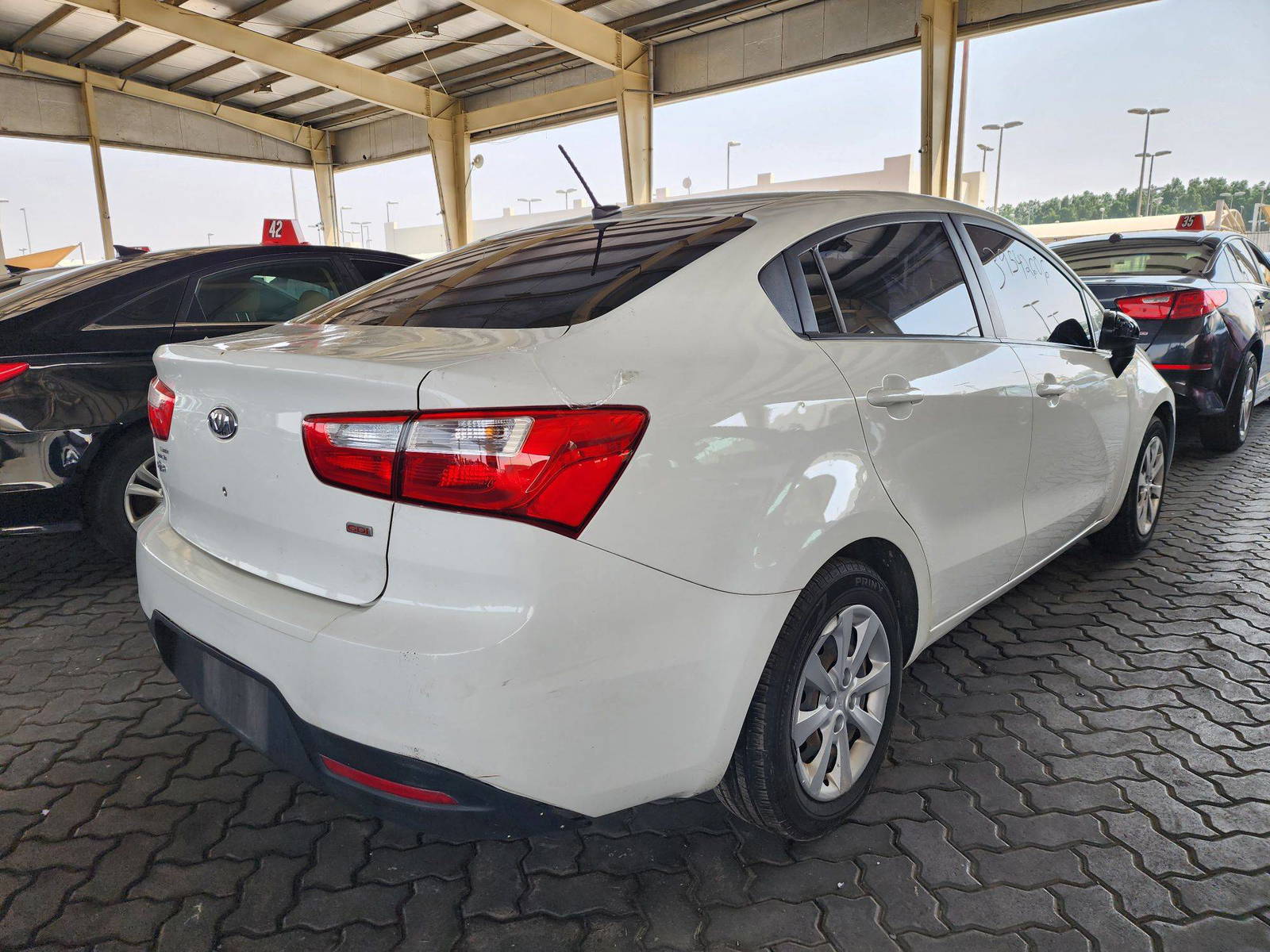 2013 KIA RIO — 148350 Miles — Lot 39542606 — Main - Marhaba Auctions Used Cars - Image 3