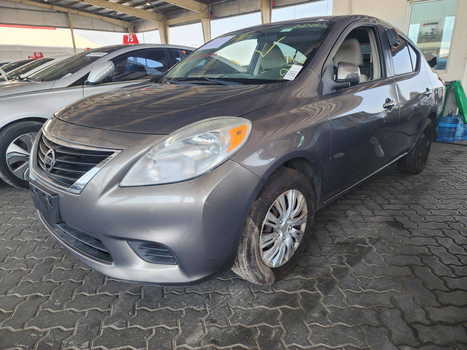2012 NISSAN VERSA — 184016 Miles — Lot 38524000 — Souq - Marhaba Auctions Used Cars - Image 3