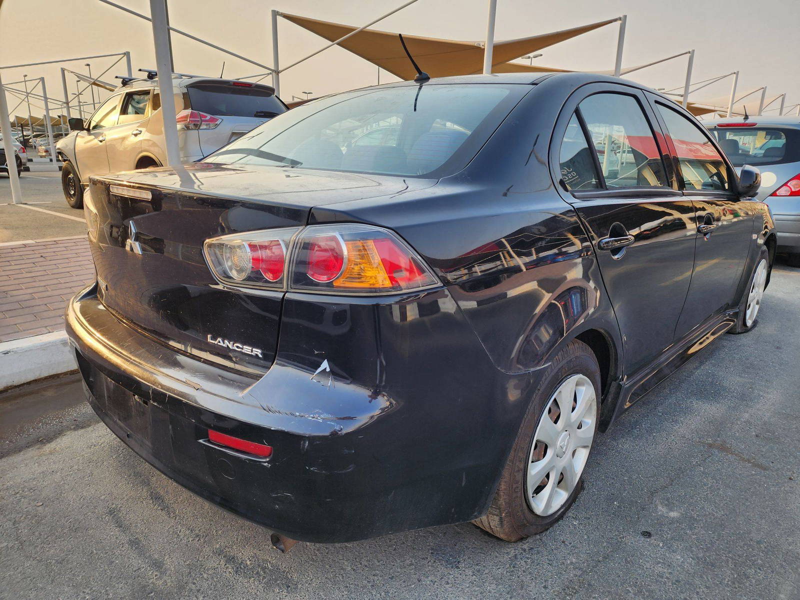 2014 MITSUBISHI LANCER — 177109 Miles — Lot 38954832 — Main - Marhaba Auctions Used Cars - Image 3