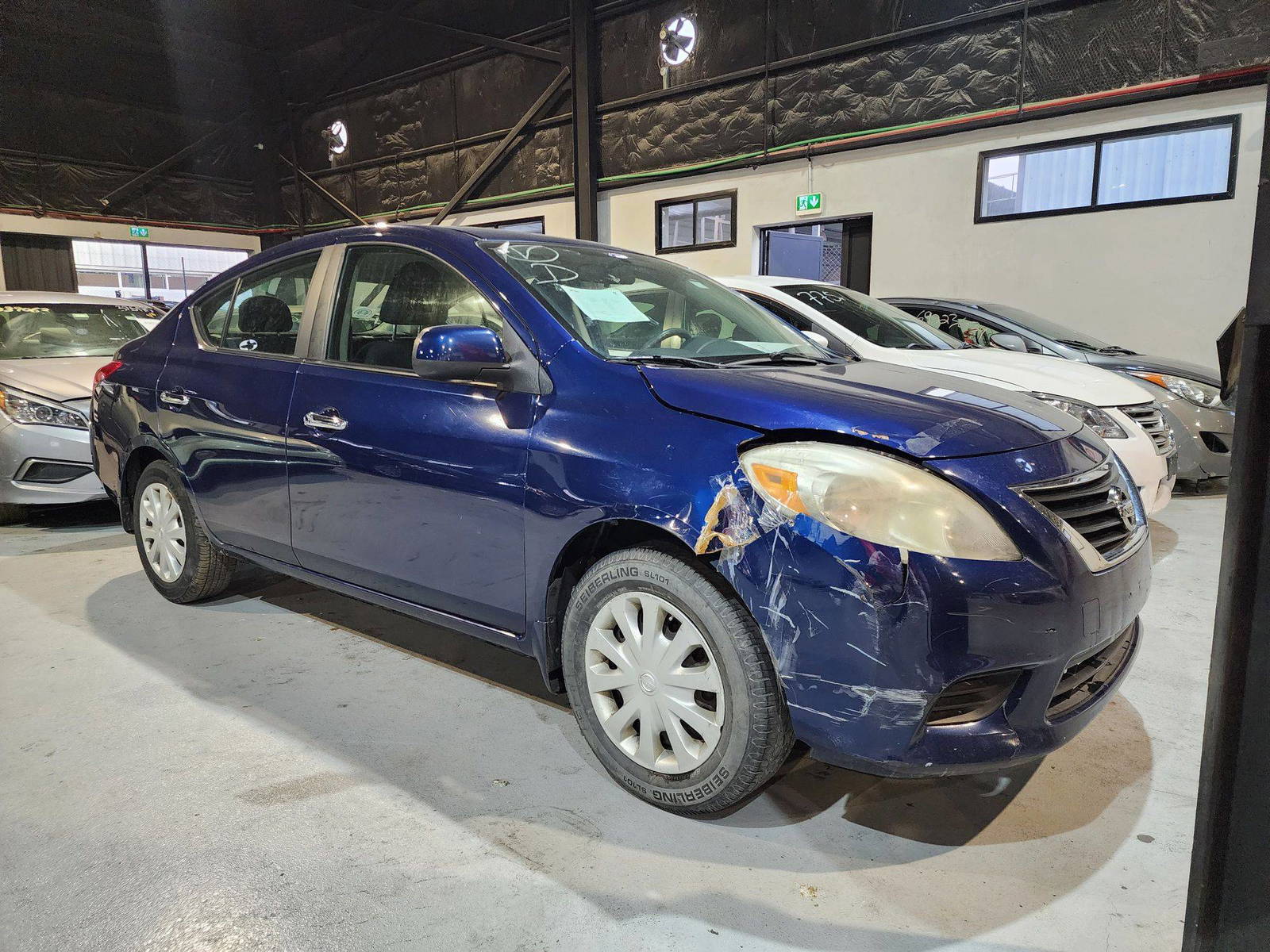 2012 NISSAN VERSA — 150192 Miles — Lot 64291524 — Al Quoz - Marhaba Auctions Used Cars - Image 4