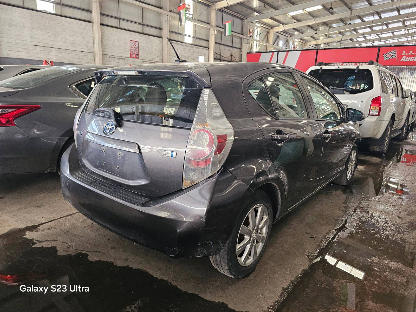 2014 TOYOTA PRIUS C — 221387 KM — Lot E1563611 — Main - Marhaba Auctions Used Cars - Image 3