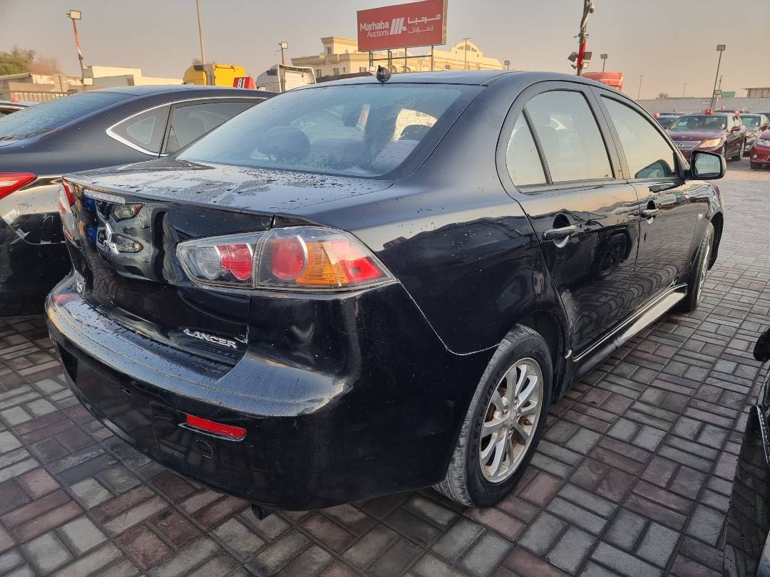 2010 MITSUBISHI LANCER — 164053 Miles — Lot 214587 — Ind. 12 - Marhaba Auctions Used Cars - Image 4