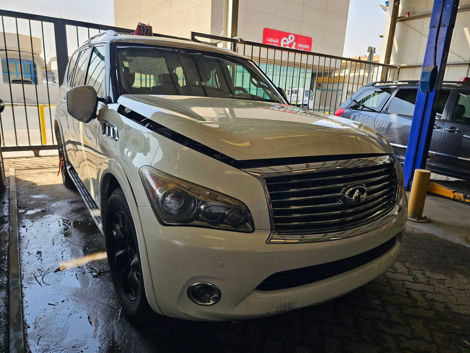 2011 INFINITI QX56 — 167591 Miles — Lot 43922342 — Main - Marhaba Auctions Used Cars - Image 4