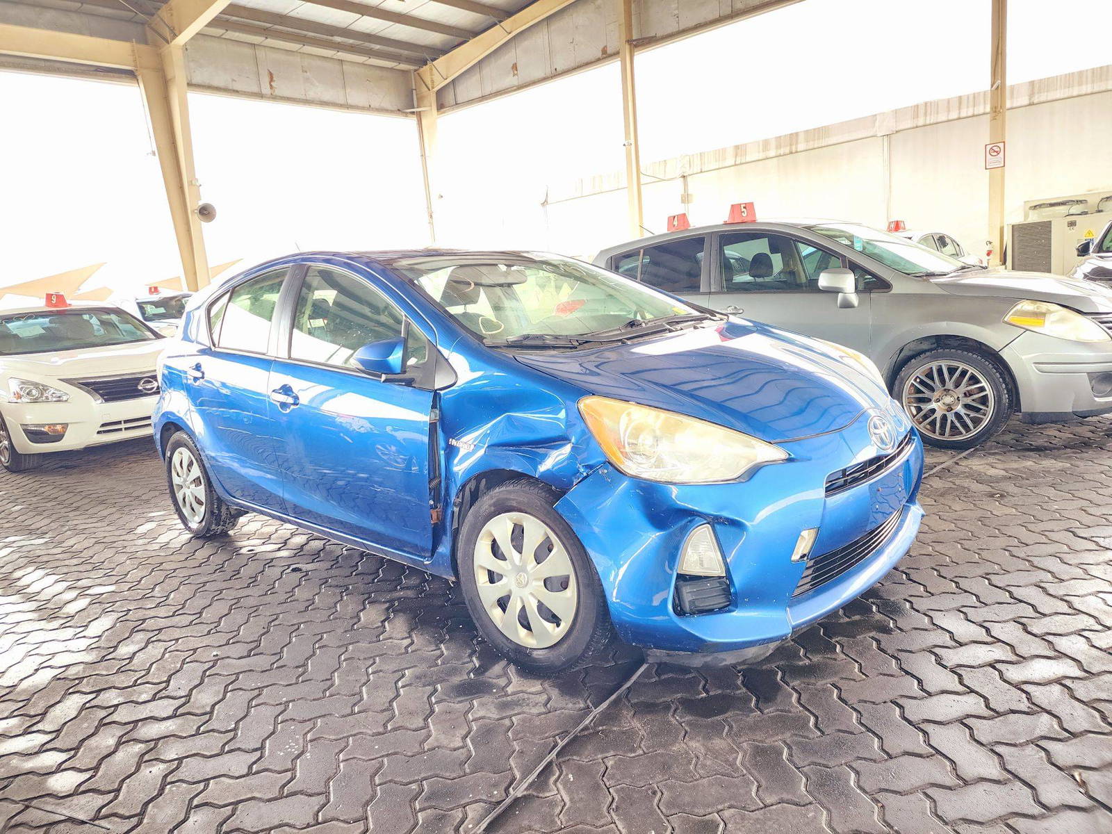 2012 TOYOTA PRIUS C — 181763 Miles — Lot 72441114 — Souq - Marhaba Auctions Used Cars - Image 4