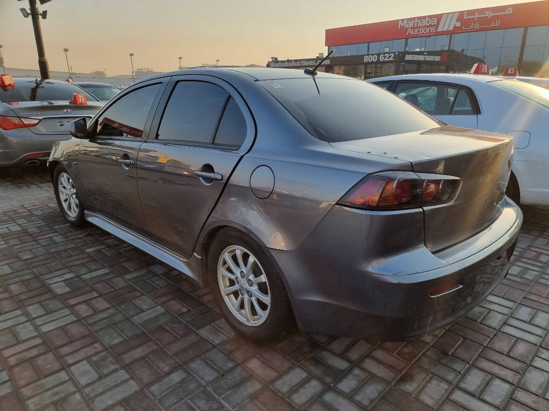 2011 MITSUBISHI LANCER — 299616 KM — Lot 125487 — Main - Marhaba Auctions Used Cars - Image 4