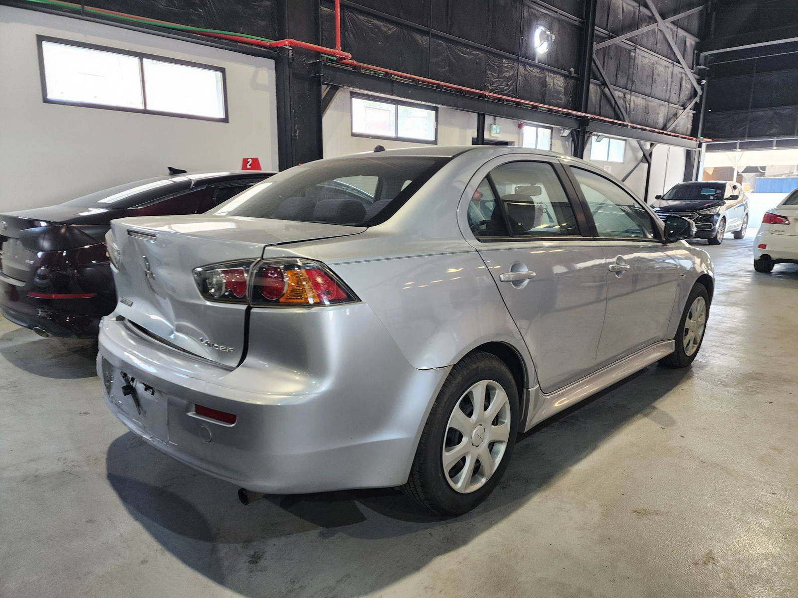 2015 MITSUBISHI LANCER — 174336 Miles — Lot 57308924 — Al Quoz - Marhaba Auctions Used Cars - Image 4