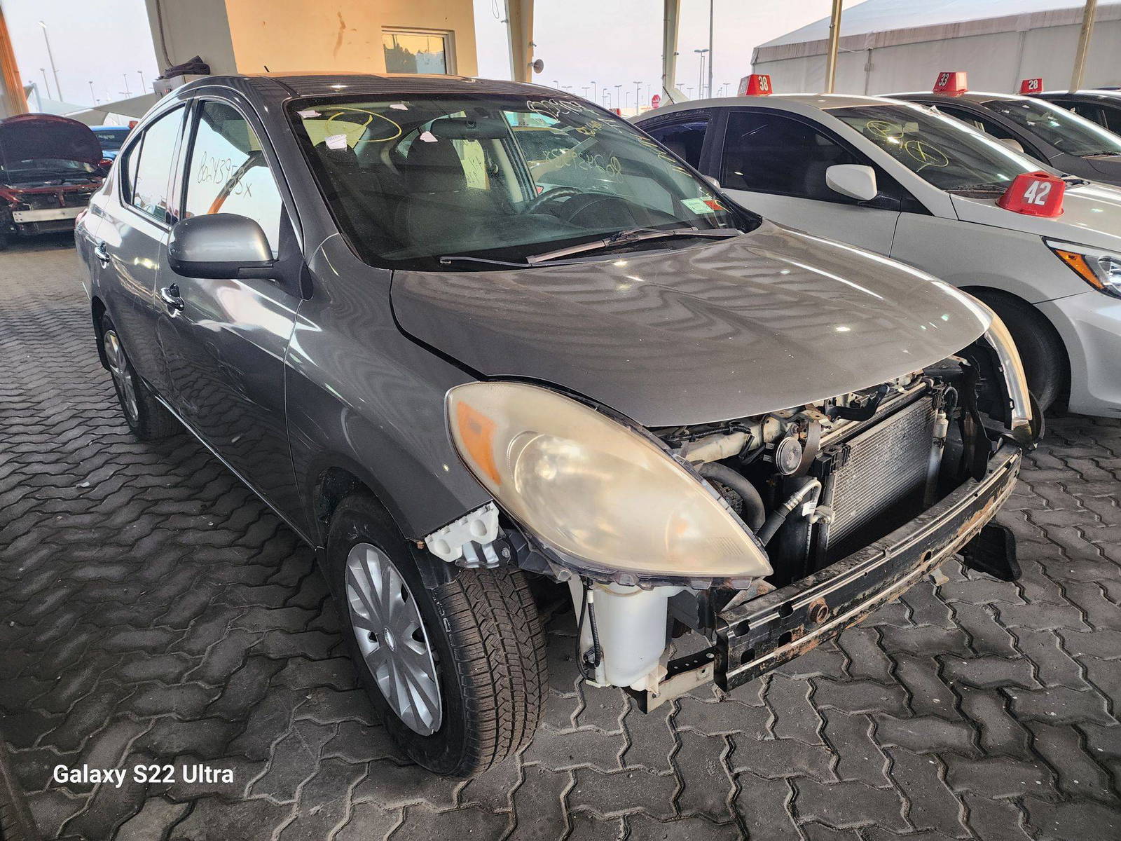 2014 NISSAN VERSA — 117474 Miles — Lot 80243953 - Marhaba Auctions Used Cars - Image 7