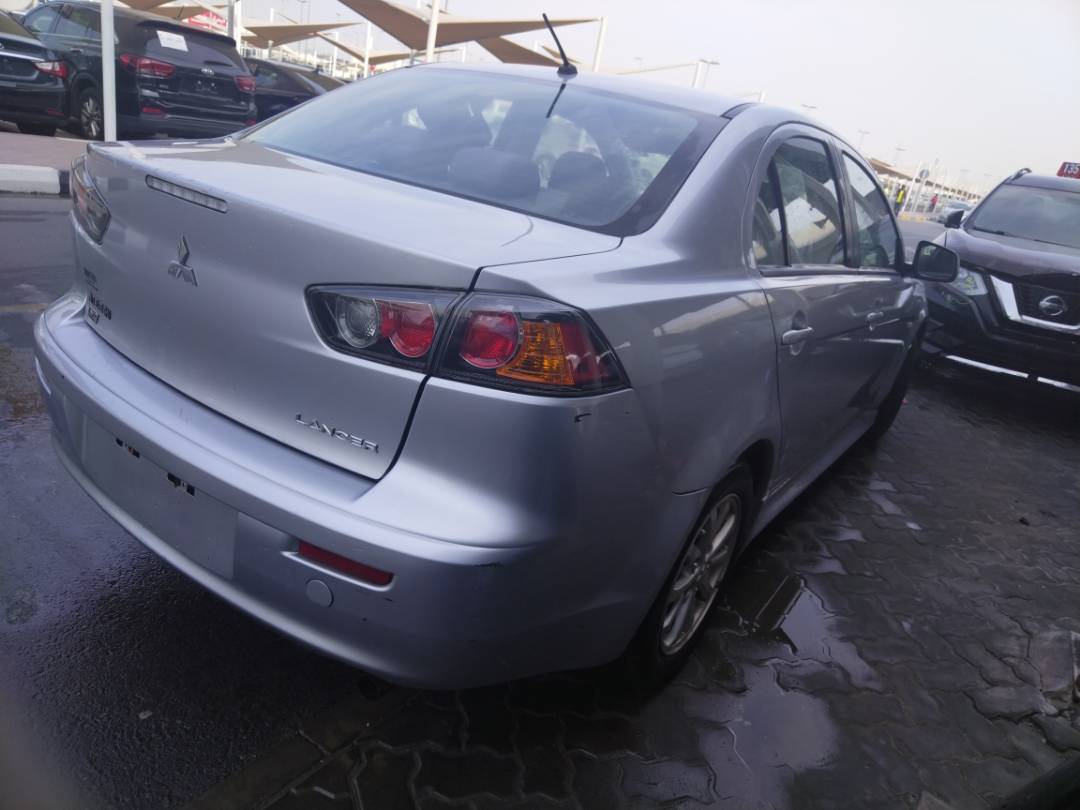 2012 MITSUBISHI LANCER — 69706 Miles — Lot 64049023 - Marhaba Auctions Used Cars - Image 7