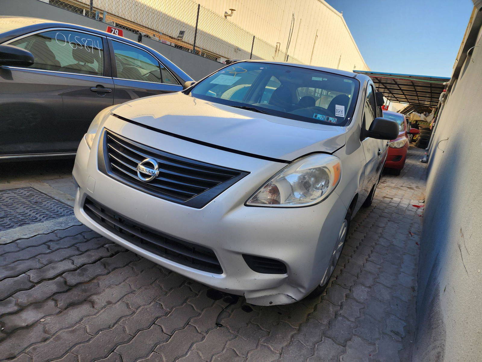 2014 NISSAN VERSA — 114493 Miles — Lot 40529877 — Al Quoz - Marhaba Auctions Used Cars - Image 4