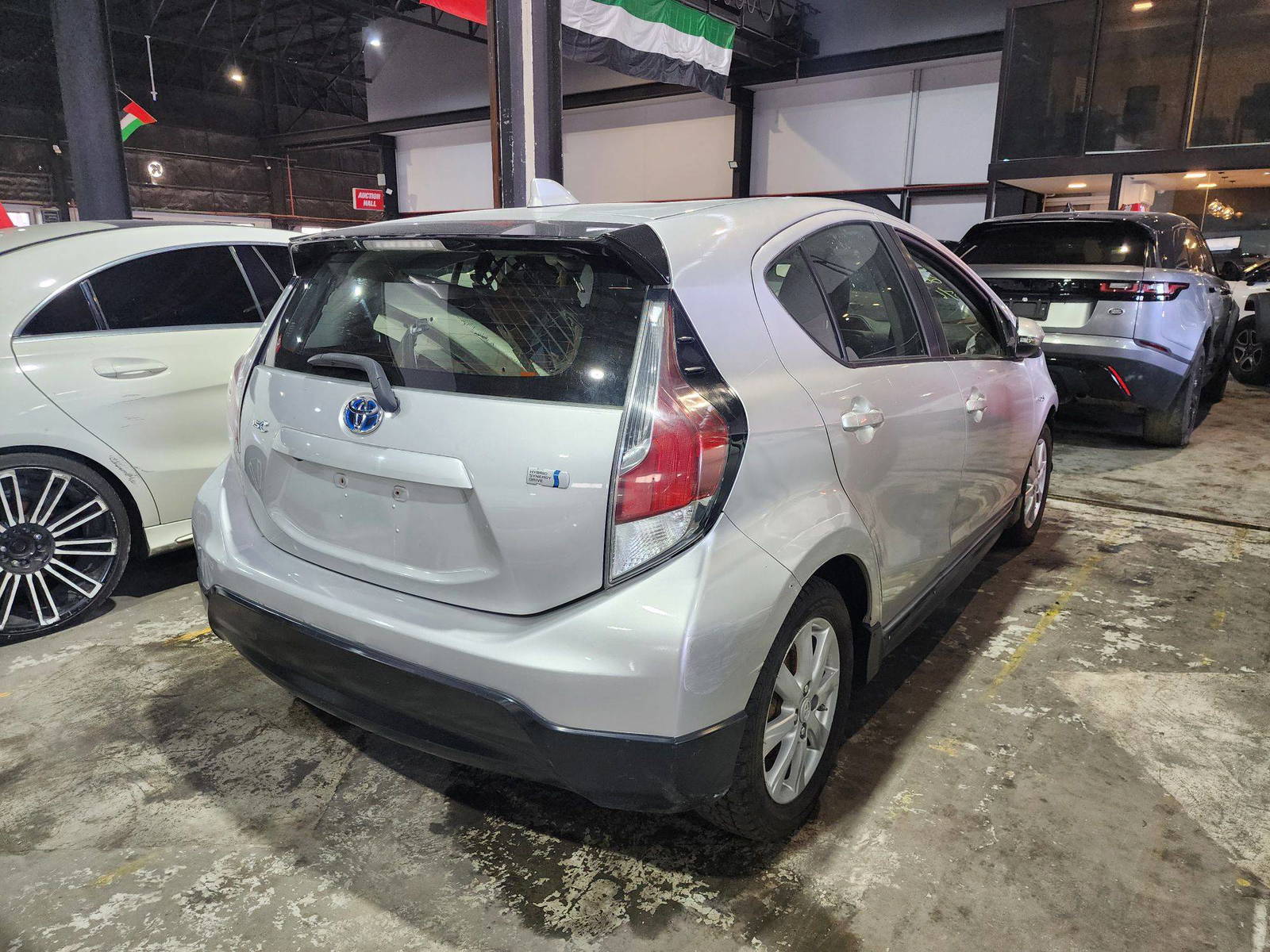 2017 TOYOTA PRIUS C — 226627 KM — Lot 12331991 — Al Quoz - Marhaba Auctions Used Cars - Image 3