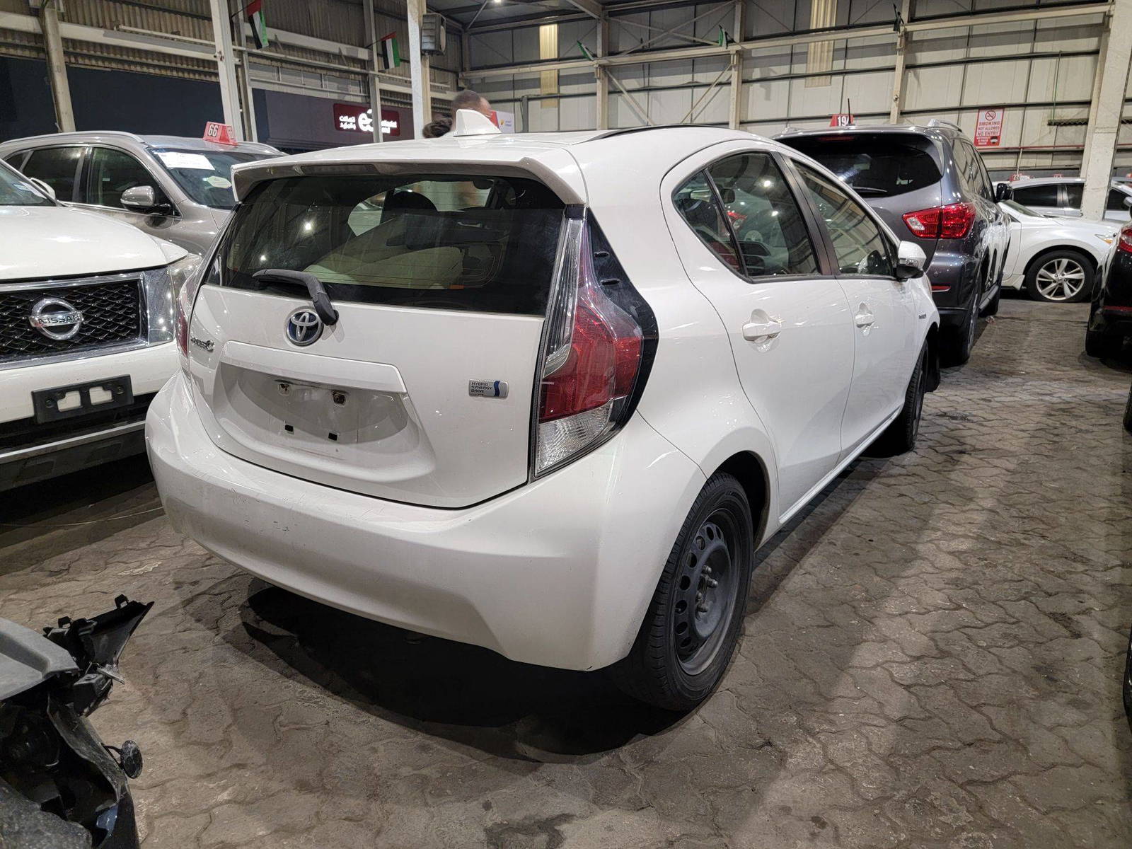 2015 TOYOTA PRIUS C — 303302 Miles — Lot 64455355 — Main - Marhaba Auctions Used Cars - Image 3