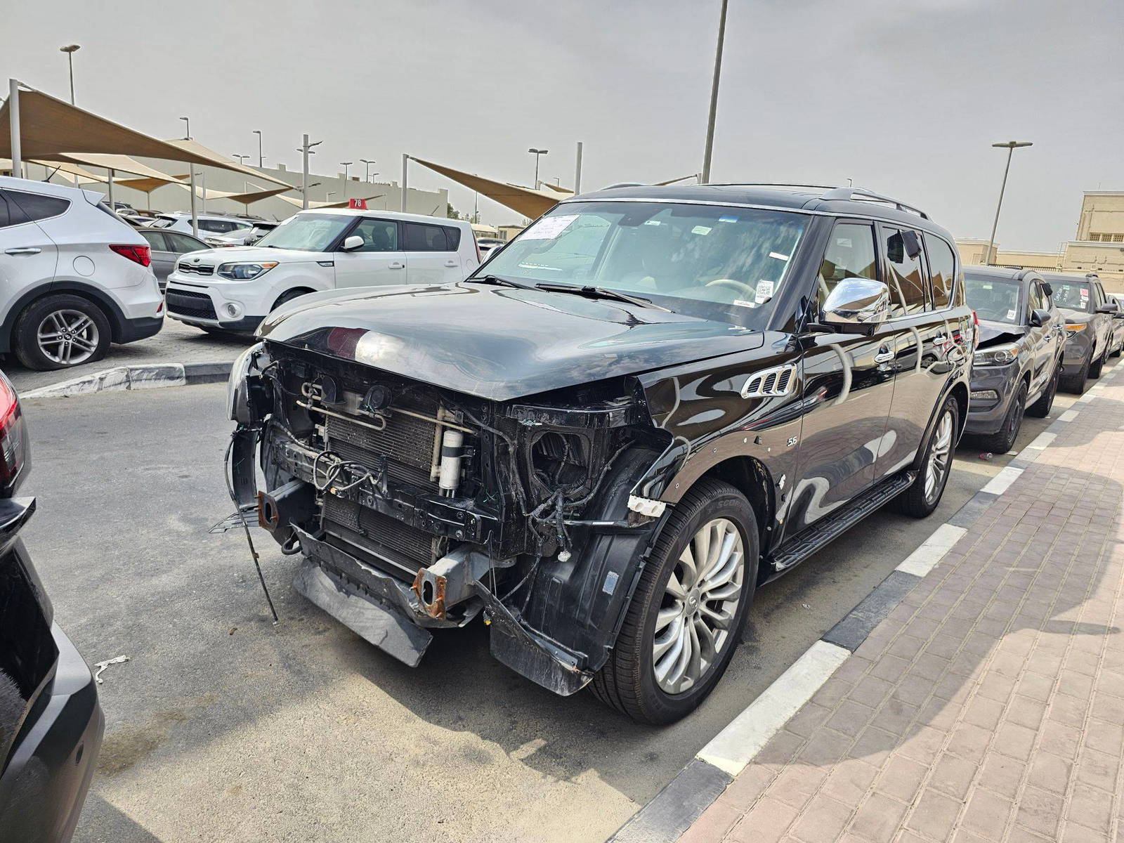 2016 INFINITI QX80 — 173766 Miles — Lot NE8G9124490 — Souq - Marhaba Auctions Used Cars - Image 4