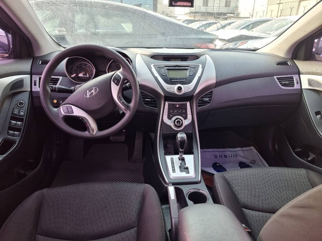 2012 HYUNDAI AVANTE — 207369 KM — Lot 125487 — Ind. 12 - Marhaba Auctions Used Cars - Image 7