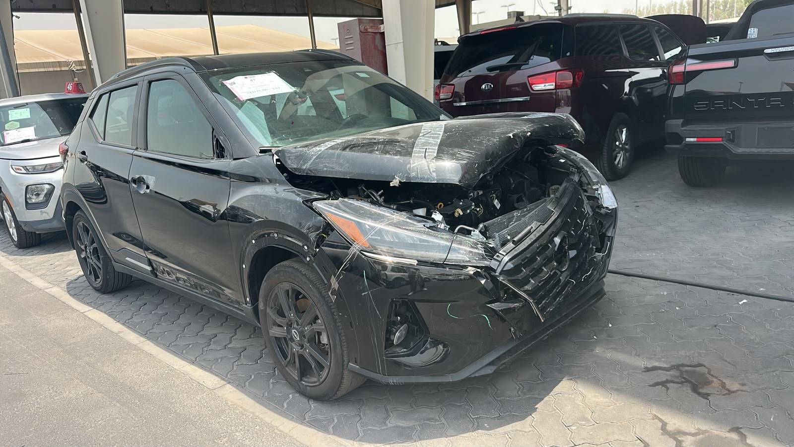 2023 NISSAN KICKS — sold — 31670 Miles — Lot 0PL507170 — Souq - Marhaba Auctions Used Cars - Image 4