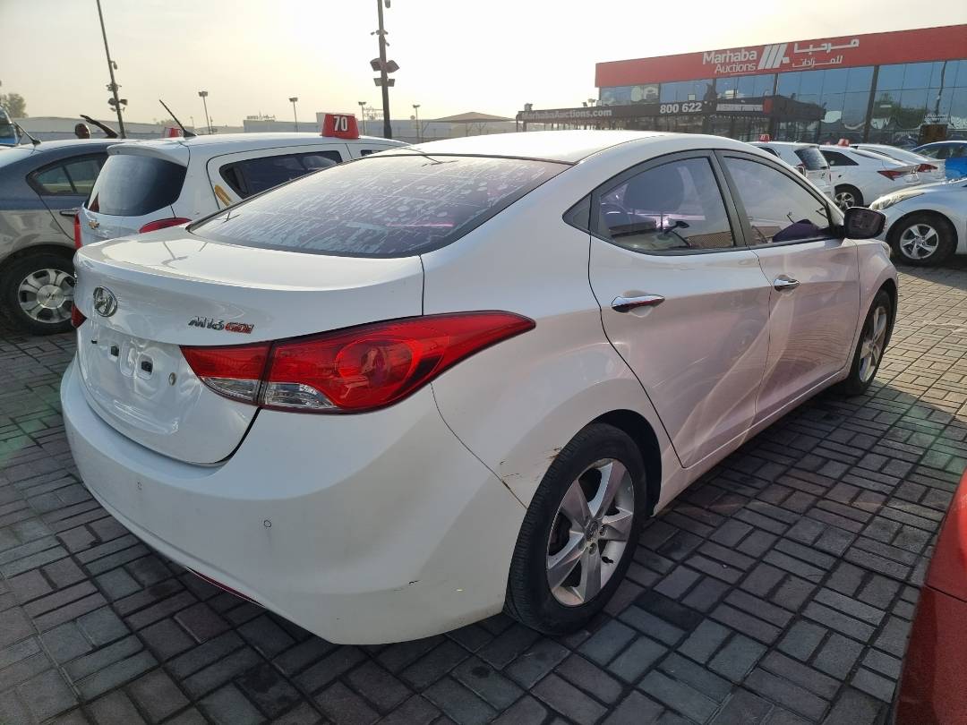 2012 HYUNDAI AVANTE — 218625 KM — Lot 125487 — Ind. 12 - Marhaba Auctions Used Cars - Image 4