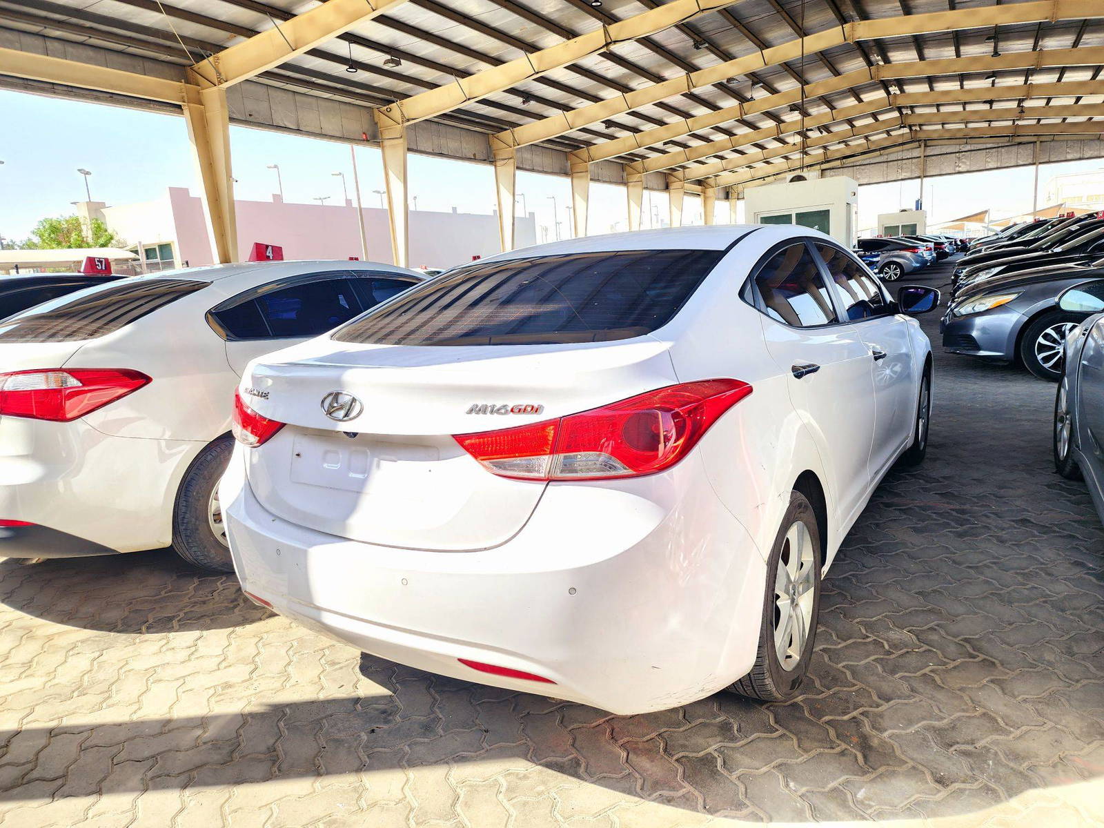 2012 HYUNDAI AVANTE — 256685 KM — Lot 560097 — Ind. 12 - Marhaba Auctions Used Cars - Image 4