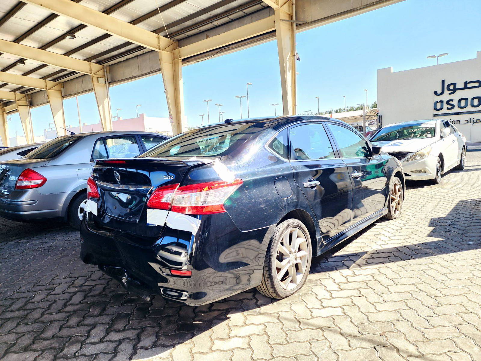 2014 NISSAN SENTRA — 148520 KM — Lot 71614224 — Souq - Marhaba Auctions Used Cars - Image 4