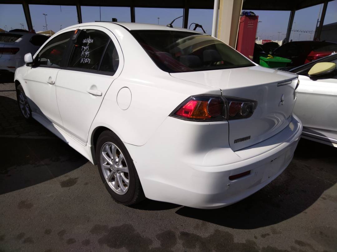 2011 MITSUBISHI LANCER — 156098 Miles — Lot 74107143 - Marhaba Auctions Used Cars - Image 10