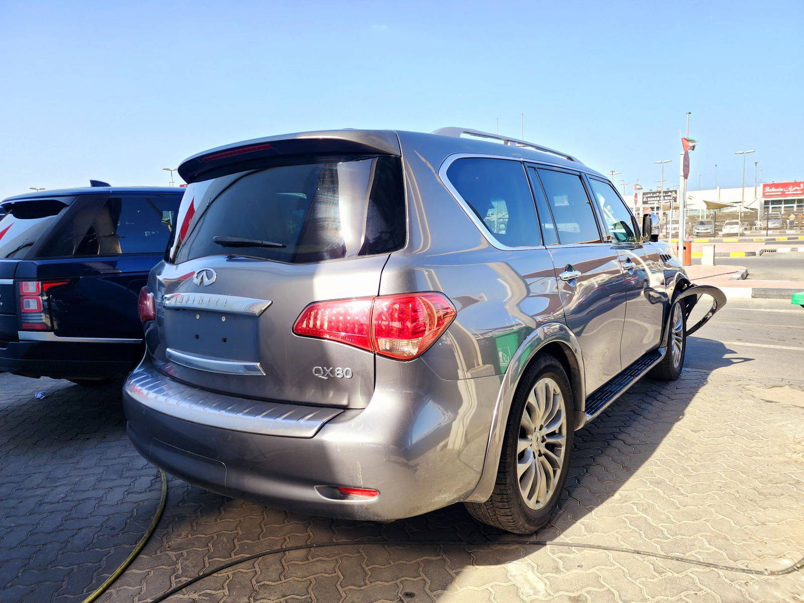 2015 INFINITI QX80 — 154333 Miles — Lot 65805134 — Souq - Marhaba Auctions Used Cars - Image 3