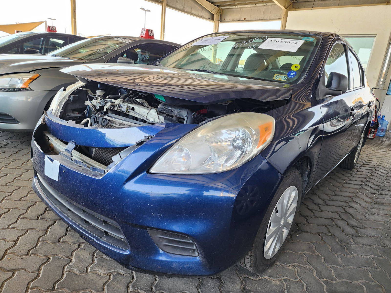 2014 NISSAN VERSA — 116869 Miles — Lot 37645074 - Marhaba Auctions Used Cars - Image 7