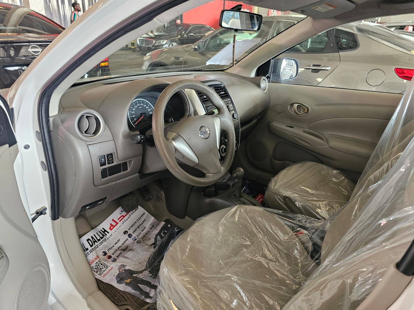 2019 NISSAN SUNNY — sold — 257595 KM — Lot KG654350 — Main - Marhaba Auctions Used Cars - Image 7
