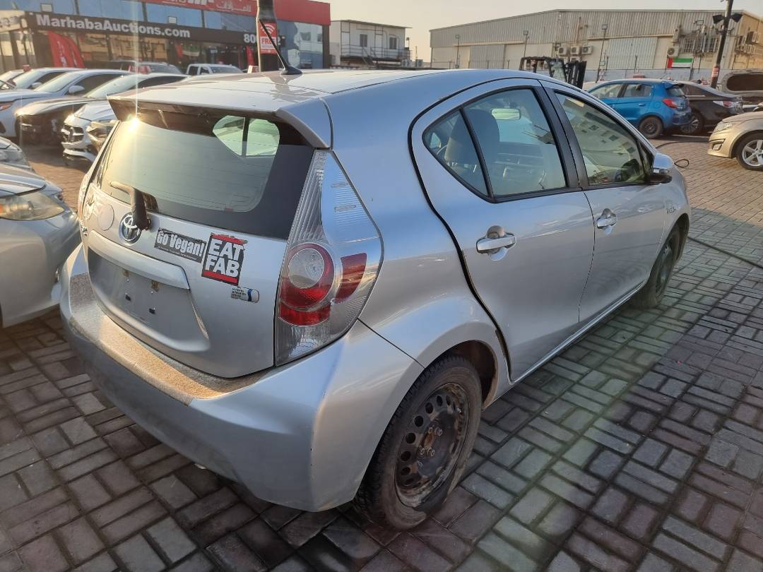 2014 TOYOTA PRIUS C — 161370 Miles — Lot 1559302 — Ind. 12 - Marhaba Auctions Used Cars - Image 4