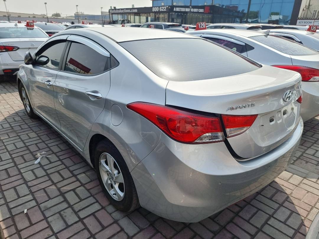 2011 HYUNDAI AVANTE — 126030 KM — Lot 124587 — Ind. 12 - Marhaba Auctions Used Cars - Image 4