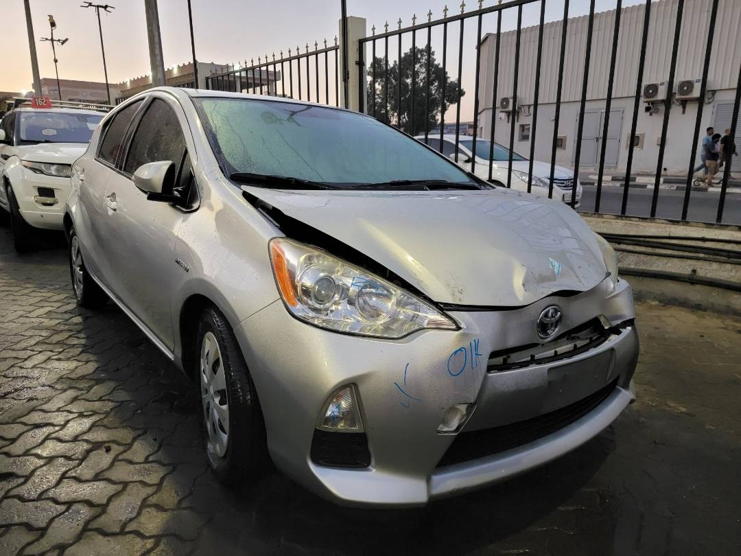 2013 TOYOTA PRIUS C — 321669 KM — Lot 12382421 — Main - Marhaba Auctions Used Cars - Image 5