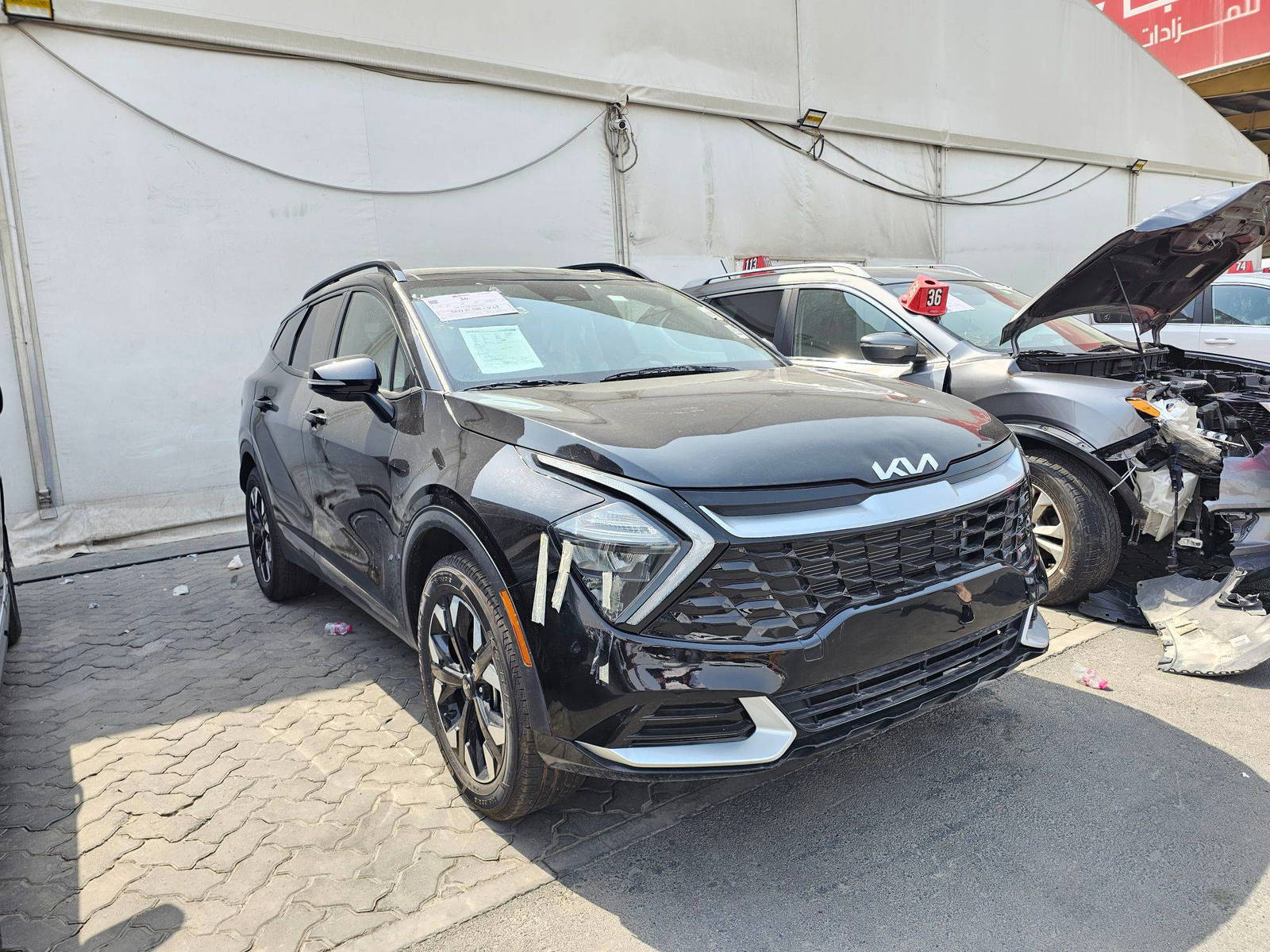 2023 KIA SPORTAGE — 28435 Miles — Lot F9PG010476 — Souq - Marhaba Auctions Used Cars - Image 4