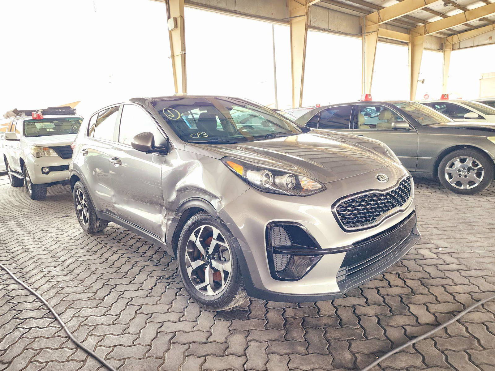 2021 KIA SPORTAGE — 97647 Miles — Lot M7867215 — Souq - Marhaba Auctions Used Cars - Image 4