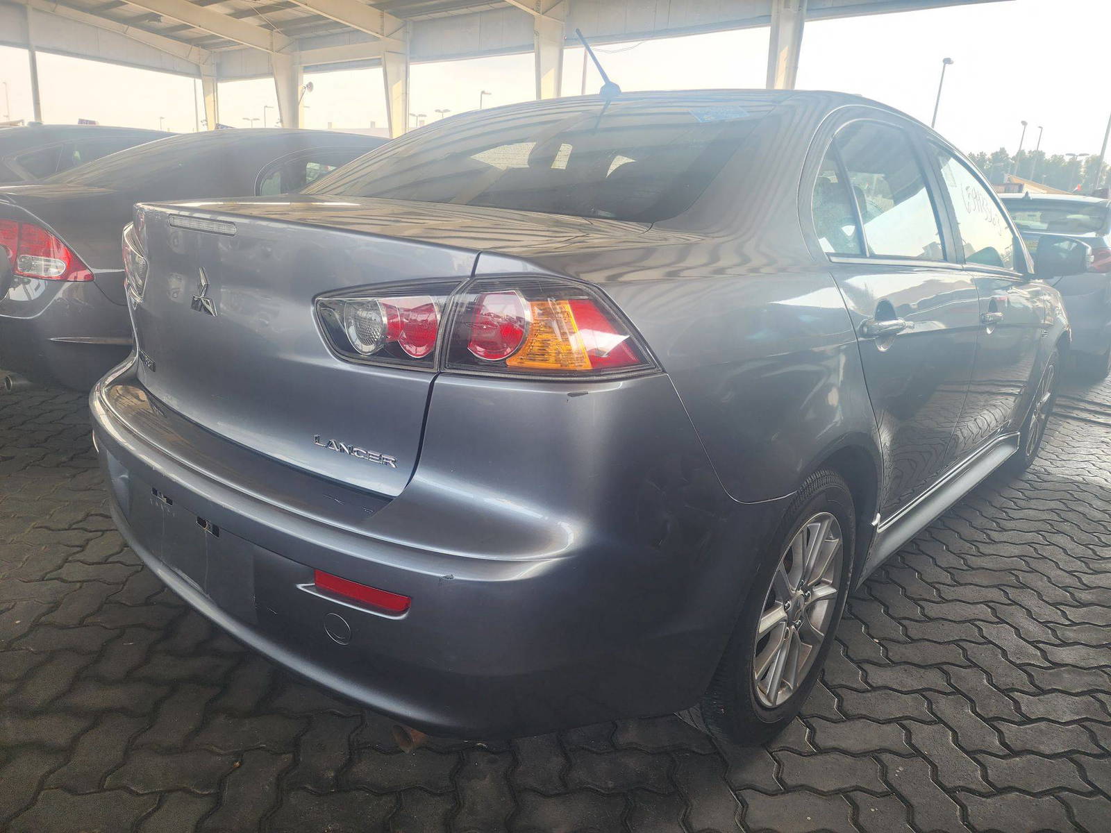 2016 MITSUBISHI LANCER — 125900 Miles — Lot 65443363 - Marhaba Auctions Used Cars - Image 10