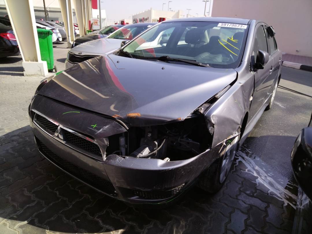 2011 MITSUBISHI LANCER — 181733 Miles — Lot 59178673 - Marhaba Auctions Used Cars - Image 10
