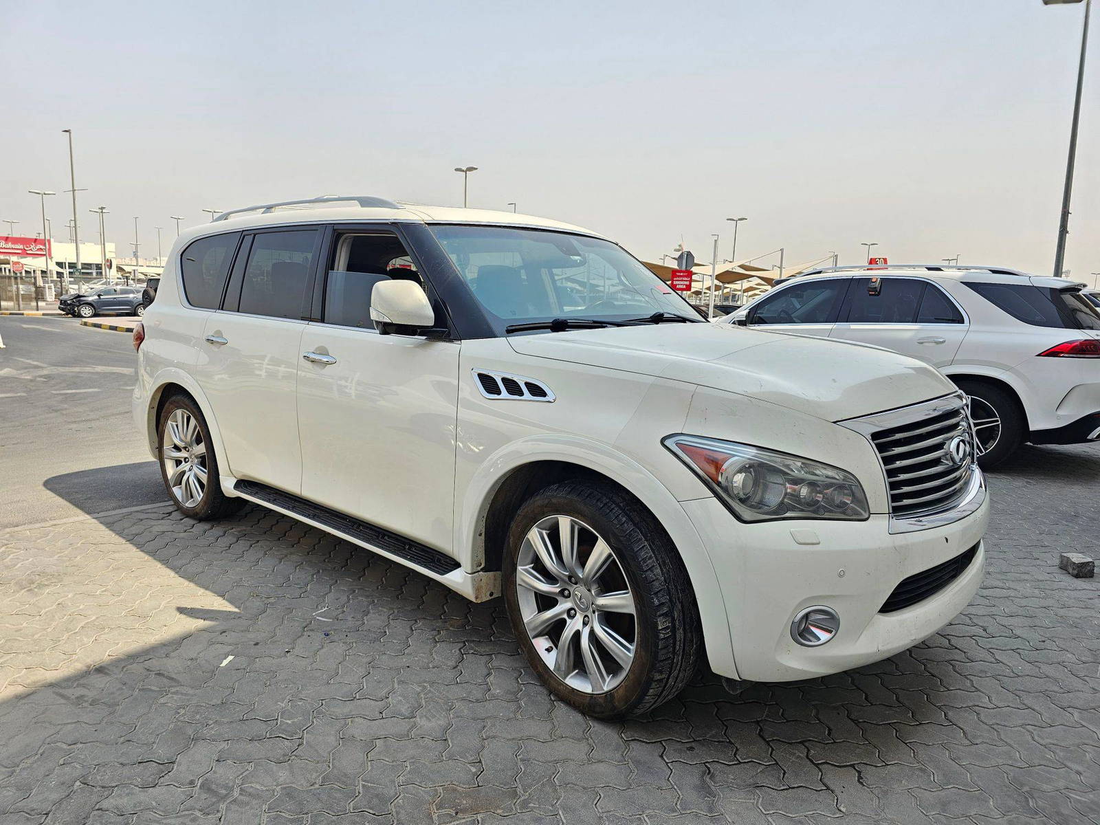 2012 INFINITI QX56 — 137383 KM — Lot 315830 — Ind. 12 - Marhaba Auctions Used Cars - Image 4