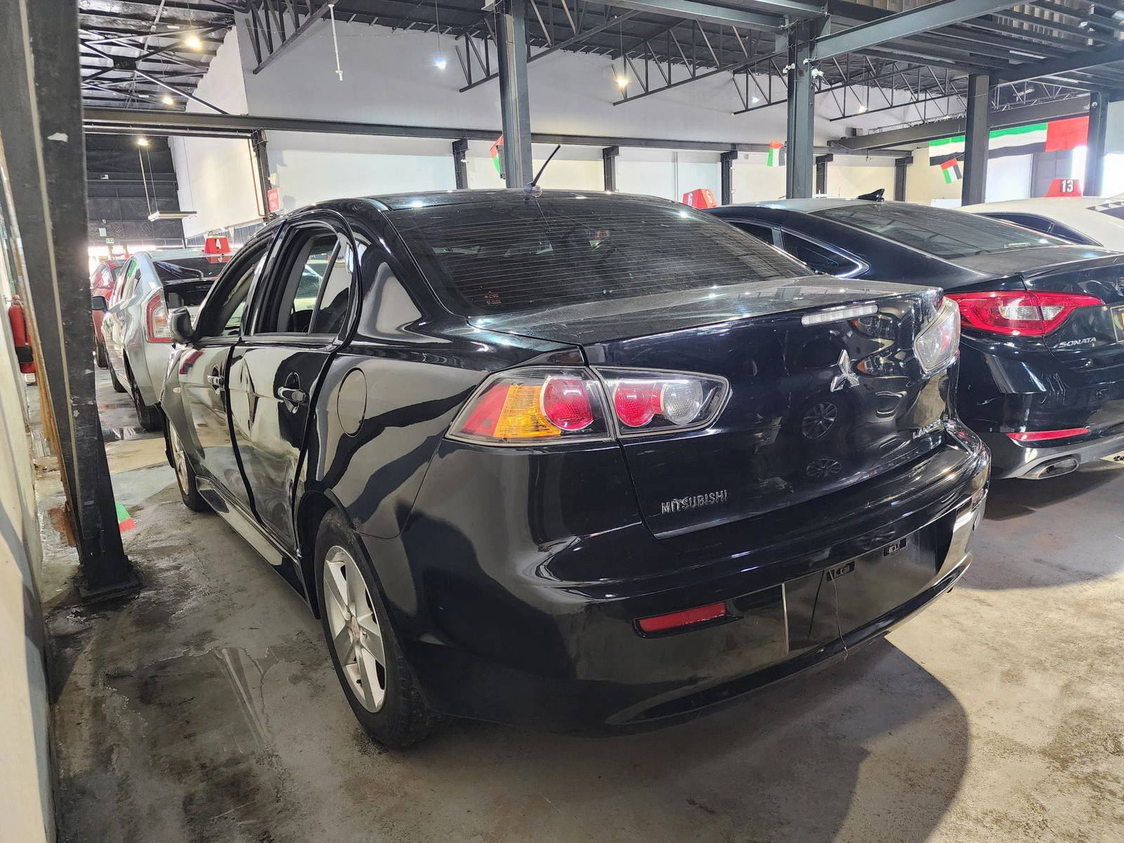 2011 MITSUBISHI LANCER — 126308 KM — Lot 71157274 — Al Quoz - Marhaba Auctions Used Cars - Image 6