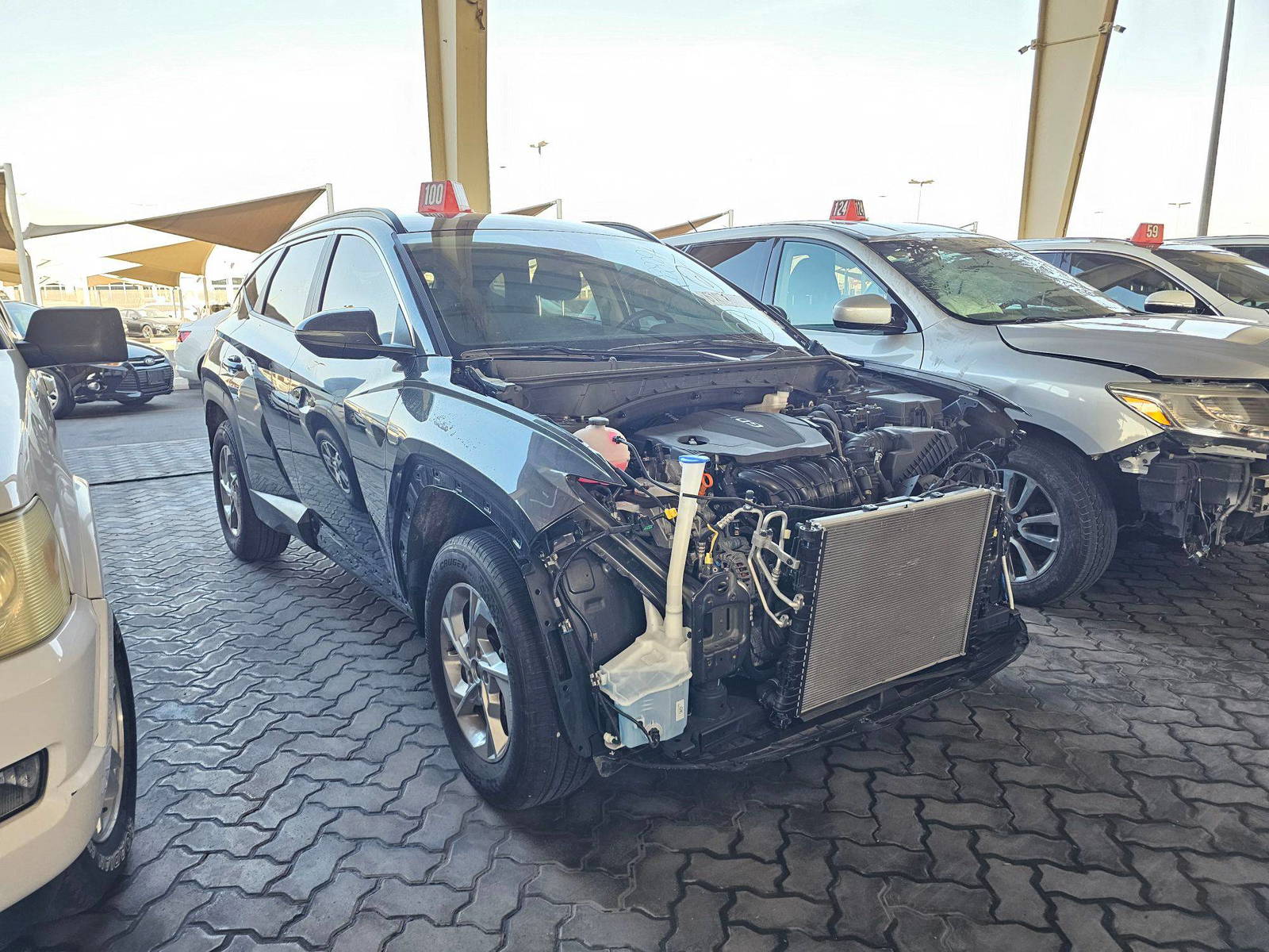 2023 HYUNDAI TUCSON — sold — 11450 Miles — Lot E0PH288297 — Souq - Marhaba Auctions Used Cars - Image 4