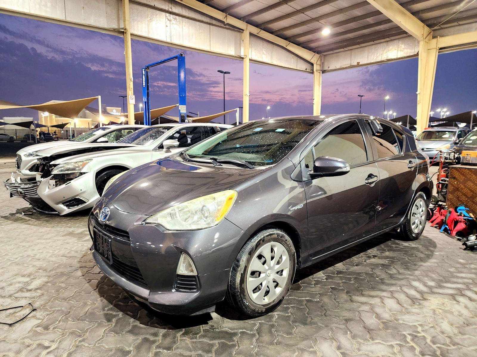 2014 TOYOTA PRIUS C — 115458 Miles — Lot 1083638 — Souq - Marhaba Auctions Used Cars - Image 4
